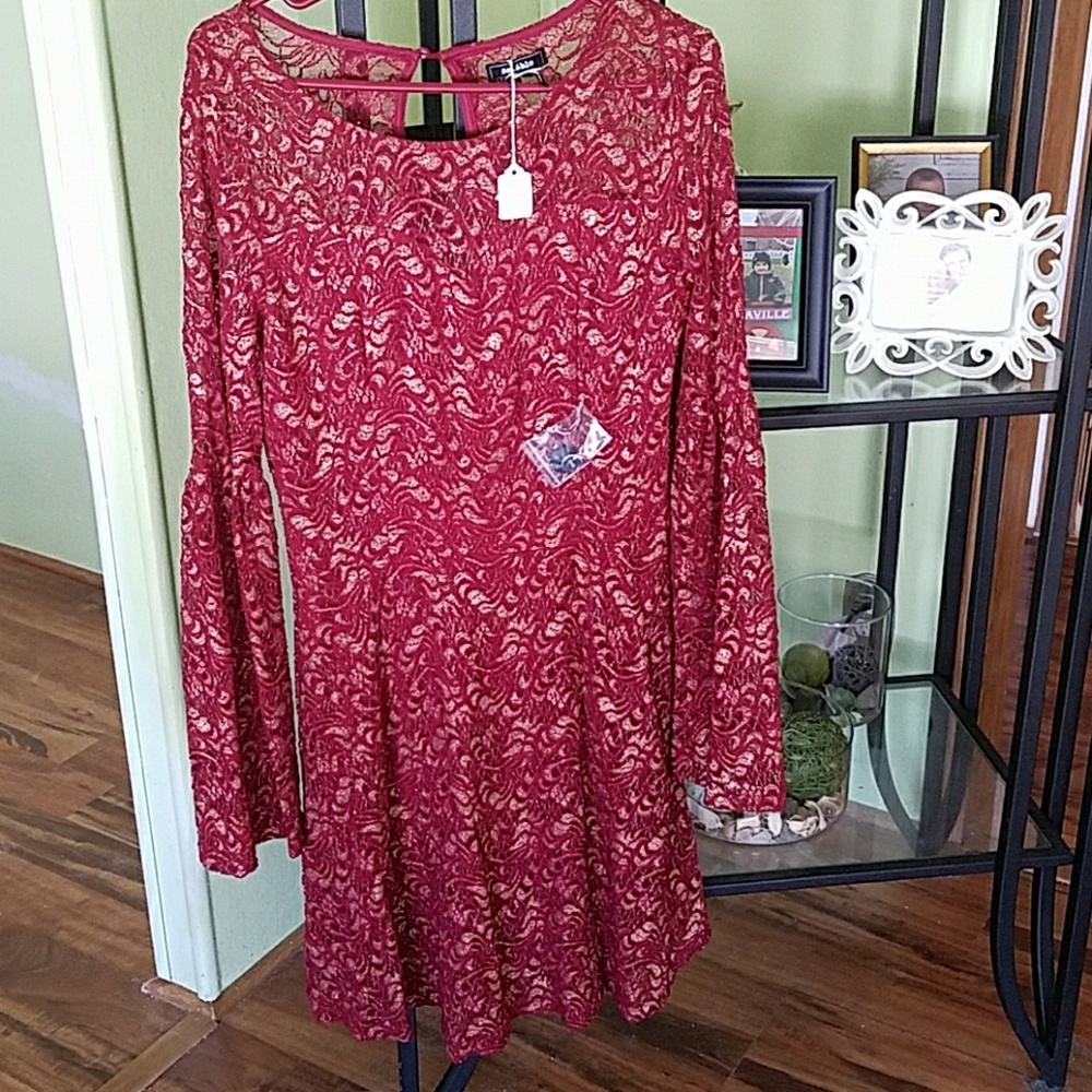 Elegant cranberry and gold lace dress